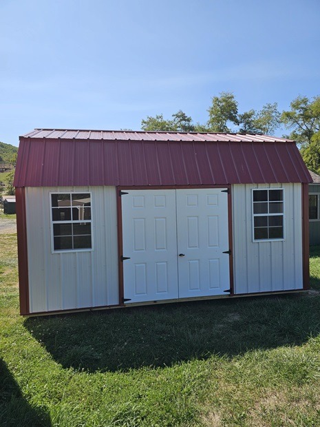 10x16 lofted barn with double door and windows and Bench