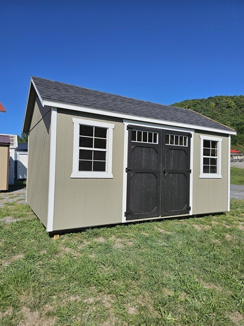 12x16 Utility shed with double doors and windows and 7 foot walls