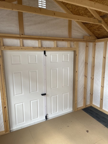 12x16 vinyl utility with dormer and double doors