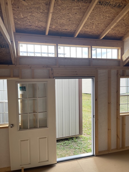 12x16 vinyl utility with dormer and multiple windows