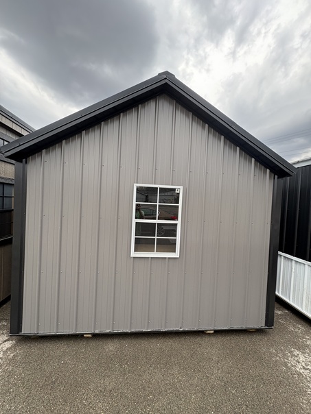 12x16 utility with metal siding and double doors and windows