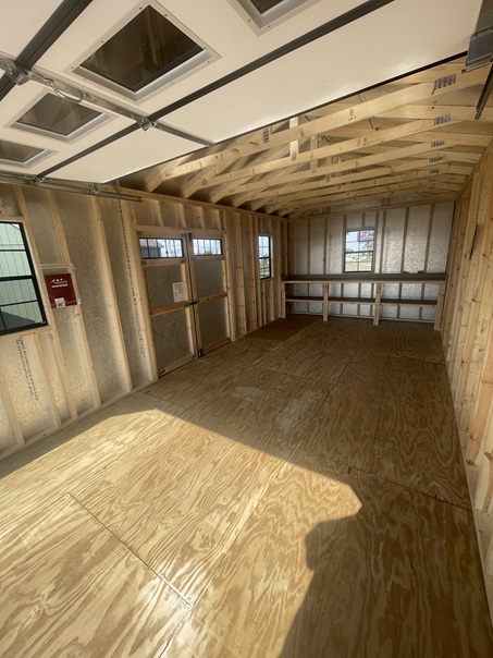 12x24 garage utility with workbench and double doors