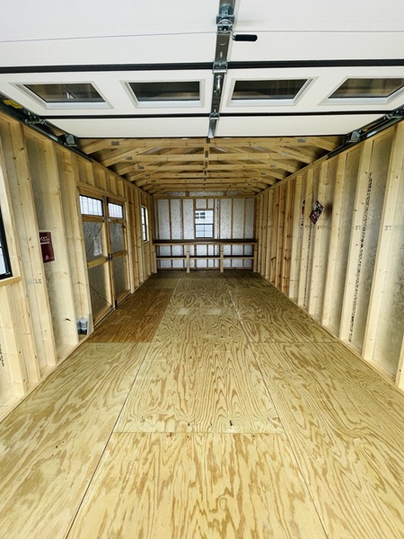 12x24 garage utility with workbench and windows