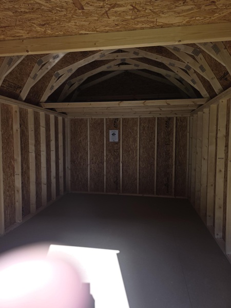 10x16 lofted barn with metal siding look inside