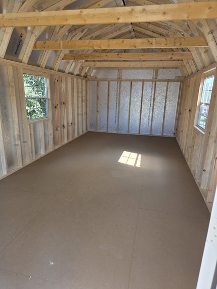 12x28 lofted barn with playhouse with custom roof and tech shield