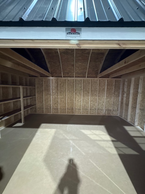 12x16 side lofted barn with shelves