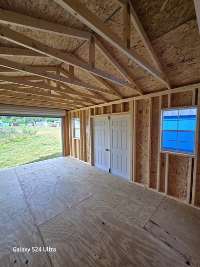 12x20 garage utility with double door and windows