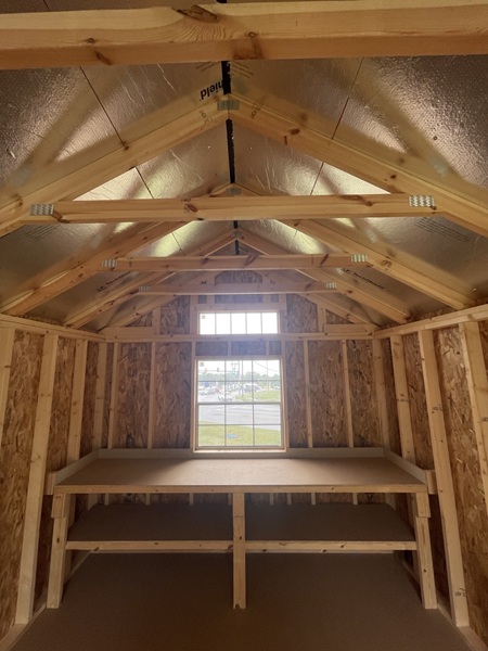 10x16 utility with metal siding and 10 foot bench