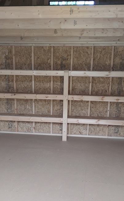 12x16 lofted barn with shelves inside