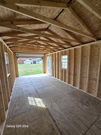 12x24 garage with windows and 9 lite door