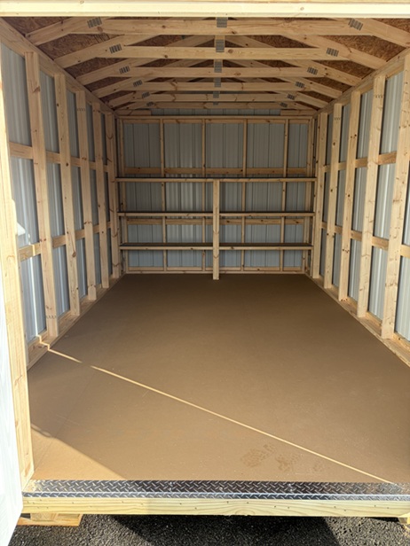 10x16 utility with metal siding and 8 foot walls look inside