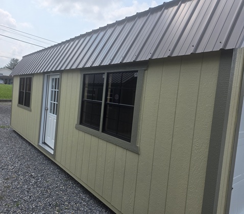 12x24 lofted garage with short 9 lite door and windows
