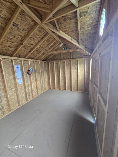 10x16 utility with gable dormer and octagonal window in WV