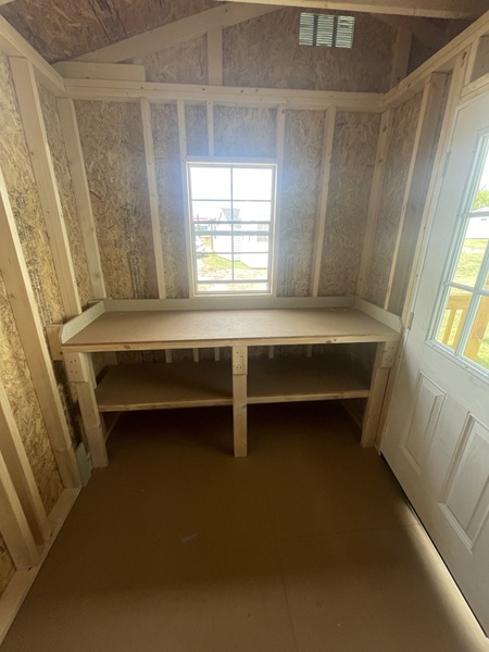 12x24 utility with side porch with shelves
