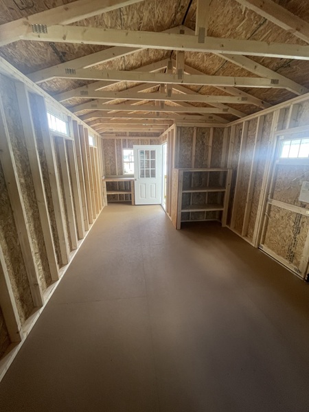 plenty of room inside this 12x24 utility with side porch