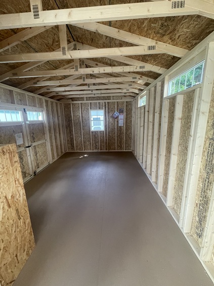 12x24 utility with side porch and 6 inch overhand on roof