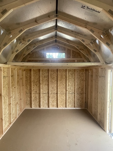 look inside 10x16 side lofted barn with Tech Shield on roof