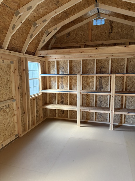 12x16 side lofted barn with windows and shelves inside on sale in West Virginia