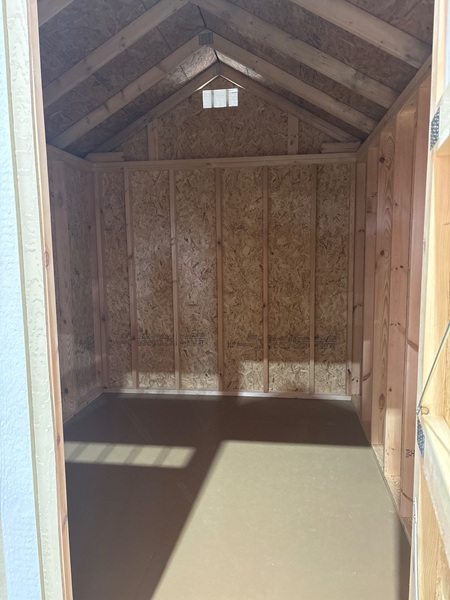 8x10 utility with 7 foot walls and double doors with windows
