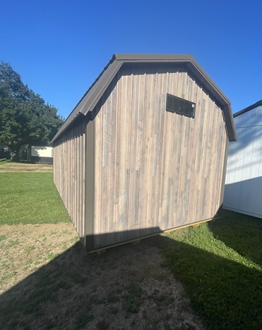 12x24 lofted barn with metal siding and windows
