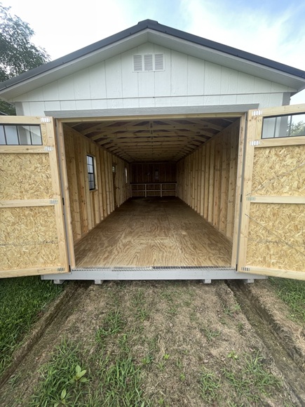 12x32 utility shed with 8 foot walls and double doors with windows black