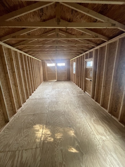 12x32 utility shed with 8 foot walls and 3 foot single door with window