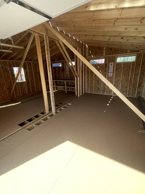 24x24 double wide garage with metal siding and 8 foot walls look inside
