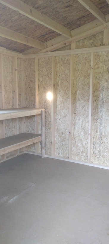 10x14 side gable with 7 foot walls and workbench inside
