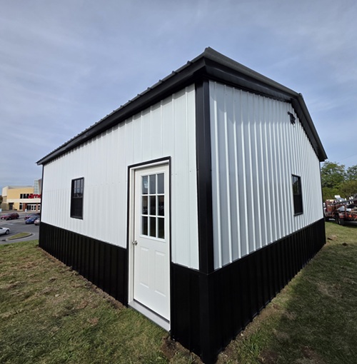 24x24 metal double wide garage with 2 garage roll-up doors and windows