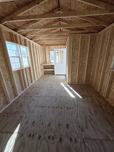 12x20 utility building with side porch and tall 9 lite door for sale in VA
